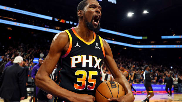 Jan 16, 2024; Phoenix, Arizona, USA; Phoenix Suns forward Kevin Durant (35) celebrates after beating the Sacramento Kings 119-117 at Footprint Center. Mandatory Credit: Mark J. Rebilas-USA TODAY Sports  